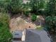 An aerial view highlighting the outdoor living area and fire pit in the backyard at 670 N Sparkman Ave, Orange City, FL 32763