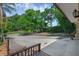Wide driveway with space for multiple cars, leading to a nicely landscaped yard at 670 N Sparkman Ave, Orange City, FL 32763
