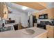 Kitchen with sleek countertops, stainless steel appliances, and wooden cabinets at 670 N Sparkman Ave, Orange City, FL 32763