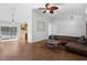 Bright and open living area featuring tile flooring, sliding glass doors, and lots of space at 670 N Sparkman Ave, Orange City, FL 32763