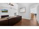 Spacious living room with high ceilings, tile flooring, and view into the kitchen at 670 N Sparkman Ave, Orange City, FL 32763