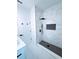 Modern bathroom showcasing a tiled shower, white vanity, and black hardware at 7147 Yacht Basin Ave # 119, Orlando, FL 32835