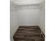 Walk-in closet with wire shelving and nice floors at 7147 Yacht Basin Ave # 119, Orlando, FL 32835