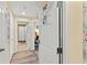 Condo entrance featuring new floors and neutral paint color at 7630 Heritage Crossing Way # 302, Reunion, FL 34747