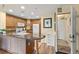 Well-equipped kitchen boasting sleek granite countertops, modern appliances, and convenient breakfast bar seating at 7630 Heritage Crossing Way # 302, Reunion, FL 34747