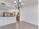 Bright dining area featuring tile floors and a view of the kitchen with stainless steel appliances at 7664 Clubhouse Estates Dr, Orlando, FL 32819