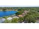 Beautiful aerial of homes nestled around a scenic lake in a lush, green neighborhood at 829 Lakeworth Cir, Lake Mary, FL 32746