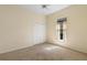 Bright bedroom with neutral walls, carpet flooring, a closet and natural light from the window at 829 Lakeworth Cir, Lake Mary, FL 32746