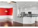 Open kitchen with stainless steel appliances and bar top seating at 829 Lakeworth Cir, Lake Mary, FL 32746