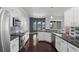 Bright kitchen features granite counters, stainless steel appliances and a tiled backsplash at 829 Lakeworth Cir, Lake Mary, FL 32746