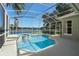 Enjoy the screened-in pool and spa with beautiful lake views, creating a serene outdoor retreat at 829 Lakeworth Cir, Lake Mary, FL 32746