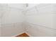 Spacious walk-in closet with white shelving and hardwood floors at 829 Lakeworth Cir, Lake Mary, FL 32746