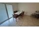 Comfortable dining area featuring a table with chairs and sliding glass door access at 890 Emerald Dr, Mount Dora, FL 32757