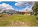 Large backyard with screened pool, offering privacy and space for outdoor activities at 10585 Sw 38Th Ave, Ocala, FL 34476