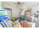 Bedroom filled with moving boxes and furniture in need of decluttering before staging at 10585 Sw 38Th Ave, Ocala, FL 34476