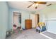 Bedroom with a closet, dresser, and toys at 10585 Sw 38Th Ave, Ocala, FL 34476