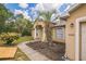 Exterior angle with palm trees and green space highlighting the address and architecture at 10585 Sw 38Th Ave, Ocala, FL 34476
