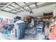 Spacious two-car garage with organization for projects and storage at 10585 Sw 38Th Ave, Ocala, FL 34476