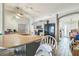 Open kitchen features a large island, modern appliances, and neutral color palette at 10585 Sw 38Th Ave, Ocala, FL 34476
