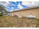 Side yard with an outdoor generator and propane tank at 10585 Sw 38Th Ave, Ocala, FL 34476