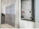 HVAC system featured next to closet doors and tile flooring, optimizing space in the home at 10585 Sw 38Th Ave, Ocala, FL 34476