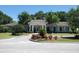 Community center surrounded by manicured landscaping, with an elegant portico and well-maintained grounds at 11120 Se 168Th Loop, Summerfield, FL 34491