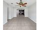 Dining room offering open floor plan, connecting seamlessly to the kitchen, and tile flooring at 1123 Hacienda Cir, Kissimmee, FL 34741
