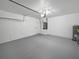 Spacious garage with painted floor at 1123 Hacienda Cir, Kissimmee, FL 34741