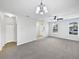 Spacious living room with carpet, featuring large windows and great natural light at 1123 Hacienda Cir, Kissimmee, FL 34741