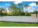 Outdoor basketball court featuring a well-maintained court, hoops, and surrounding greenery at 13622 Cygnus Dr, Orlando, FL 32828