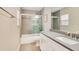Contemporary bathroom with tiled shower over tub and modern vanity at 13622 Cygnus Dr, Orlando, FL 32828