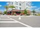 Bowigens restaurant exterior view with modern design, outdoor seating, and street access at 13622 Cygnus Dr, Orlando, FL 32828