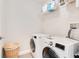 Convenient laundry room with modern washer and dryer units at 13622 Cygnus Dr, Orlando, FL 32828