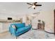 Bright living room with an open floor plan leading into the kitchen and dining area at 13622 Cygnus Dr, Orlando, FL 32828