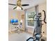 Bright home office with ergonomic setup and exercise equipment at 13622 Cygnus Dr, Orlando, FL 32828
