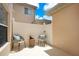 Cozy outdoor patio with wicker furniture and privacy fence at 13622 Cygnus Dr, Orlando, FL 32828