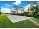 Community sand volleyball court on a sunny day with lush surroundings for outdoor fun and recreation at 13622 Cygnus Dr, Orlando, FL 32828