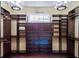 Organized walk-in closet with custom shelving, drawers, and stylish lighting, offering ample storage space at 1400 Place Picardy, Winter Park, FL 32789