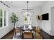 Cozy dining room with modern chandelier, perfect for intimate gatherings at 1400 Place Picardy, Winter Park, FL 32789