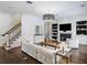 Stylish living room with a fireplace, built-in shelving, and comfortable seating at 1400 Place Picardy, Winter Park, FL 32789