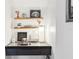 This desk features two floating shelves and decor at 1578 Farrindon Cir # 1578, Lake Mary, FL 32746