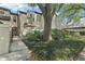 Charming townhome exterior featuring a landscaped front yard and inviting entrance with a covered patio at 1578 Farrindon Cir # 1578, Lake Mary, FL 32746