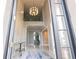 Grand foyer with high ceilings, statement chandelier, and marble flooring at 16054 Johns Lake Overlook Dr, Winter Garden, FL 34787