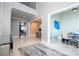 Elegant foyer leading to an open floor plan with high ceilings at 16054 Johns Lake Overlook Dr, Winter Garden, FL 34787