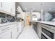 Beautiful kitchen with stainless steel appliances and open floor plan at 16054 Johns Lake Overlook Dr, Winter Garden, FL 34787