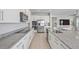 Modern kitchen featuring granite countertops and stainless steel appliances at 1616 Eucalyptus Way, Davenport, FL 33837
