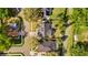 Drone shot of the home showing the roof, backyard, and surrounding neighborhood at 1667 Spring Loop Way, Winter Garden, FL 34787