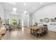 Open living space featuring large windows, skylights and a seating area at 1667 Spring Loop Way, Winter Garden, FL 34787