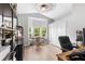 Inviting office space with natural light, vaulted ceiling, and ample storage at 1667 Spring Loop Way, Winter Garden, FL 34787