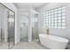 Luxury bathroom with soaking tub and separate shower at 169 Winding Oaks Ln, Oviedo, FL 32765